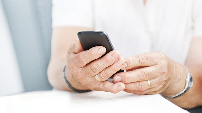 An older person using a smartphone